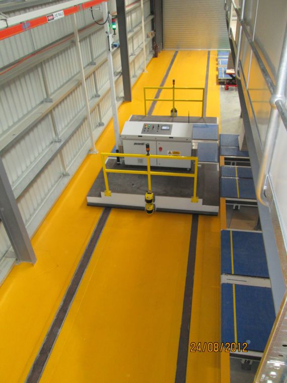 A Stedi-Stak transfer cart that can transfer between multiple conveyor lines